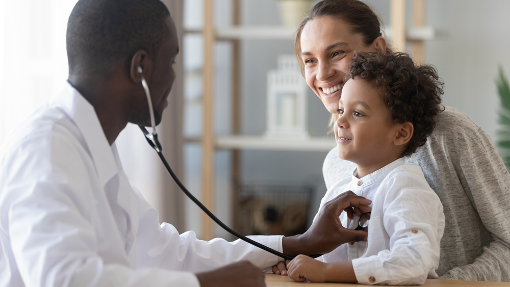 Doctor checking on child